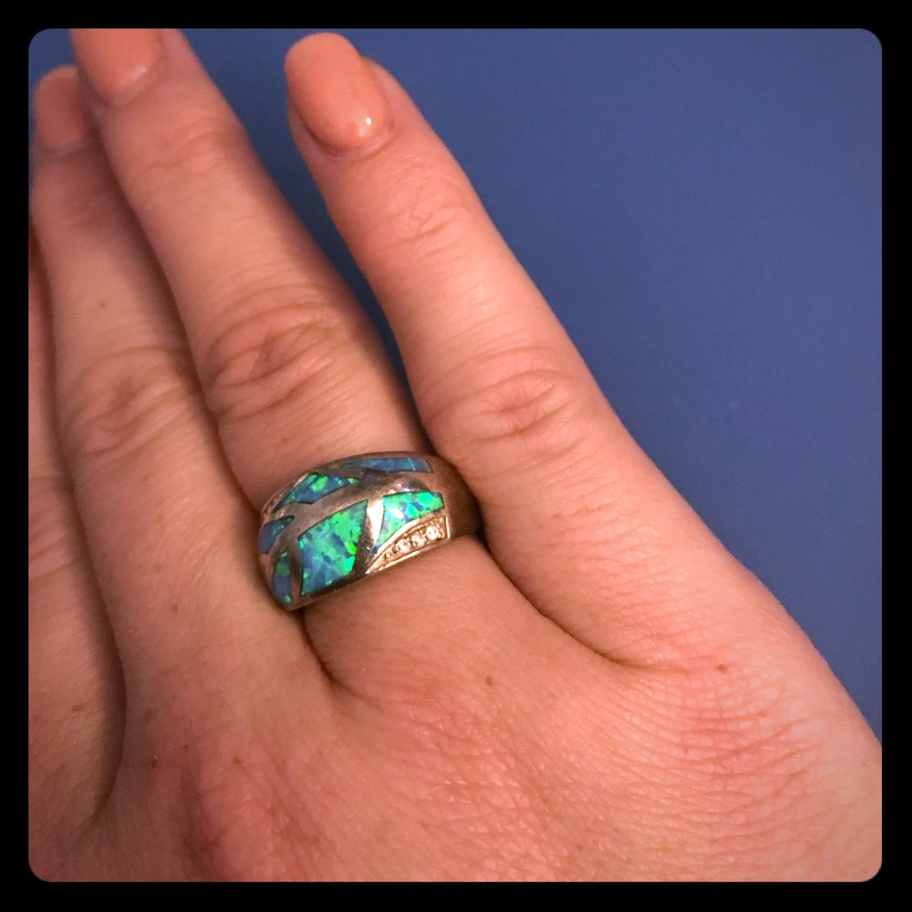 Genuine opal, sterling silver and CZ. Size 7